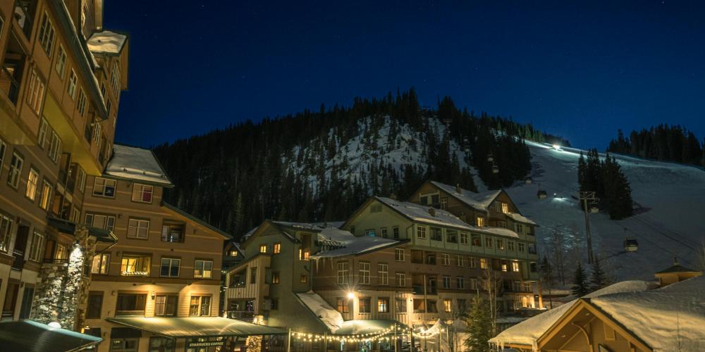 Luxury ski chalet in Aspen with snowy mountain backdrop