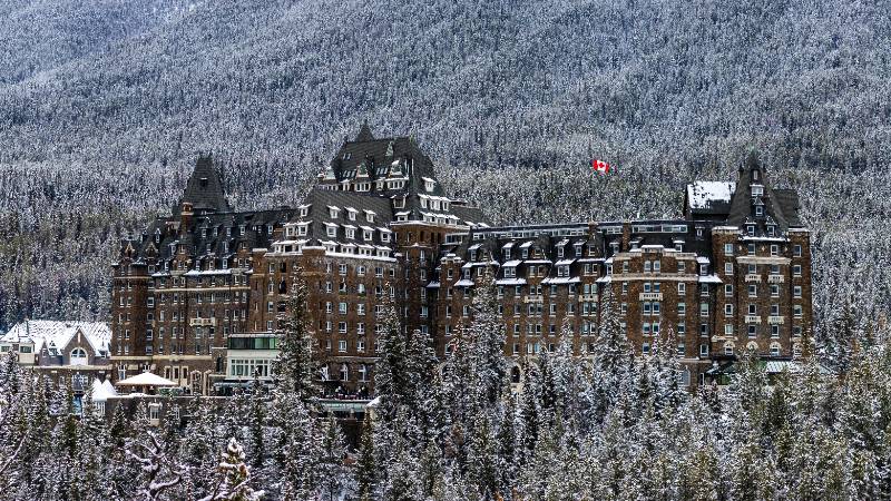 The historic Fairmont Banff Springs Hotel, the 'Castle in the Rockies', amidst stunning mountain scenery