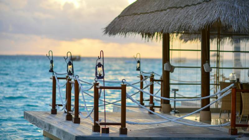 Private deck of an overwater bungalow in Bora Bora with direct lagoon access