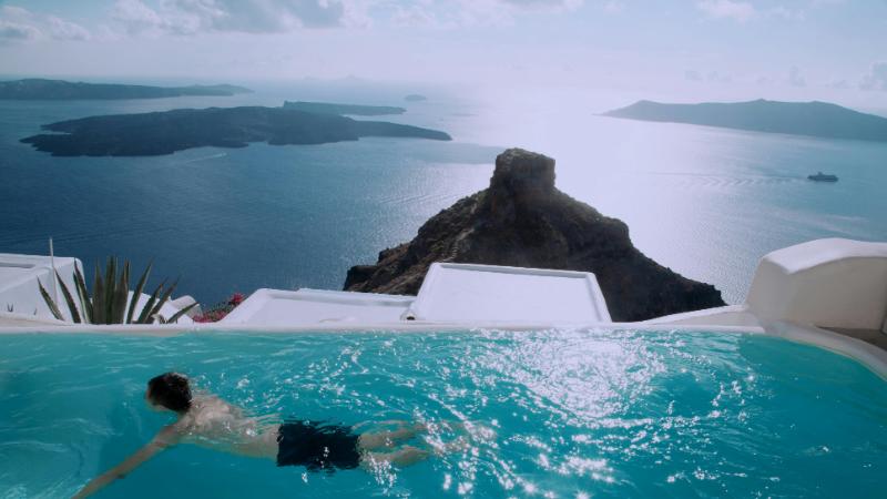 Luxury infinity pool in Santorini overlooking the caldera and Aegean Sea