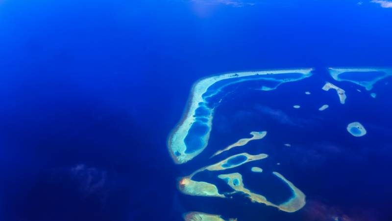 Beautiful Maldivian atoll with turquoise water and white sand beaches