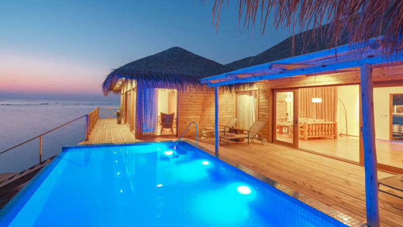 Interior of a luxurious overwater bungalow in the Maldives