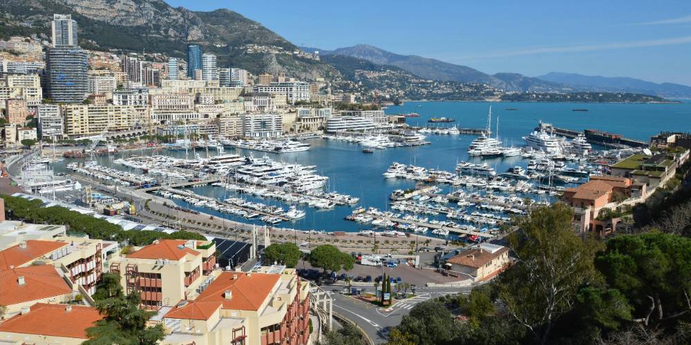 The magnificent Port Hercules in Monaco filled with luxury superyachts