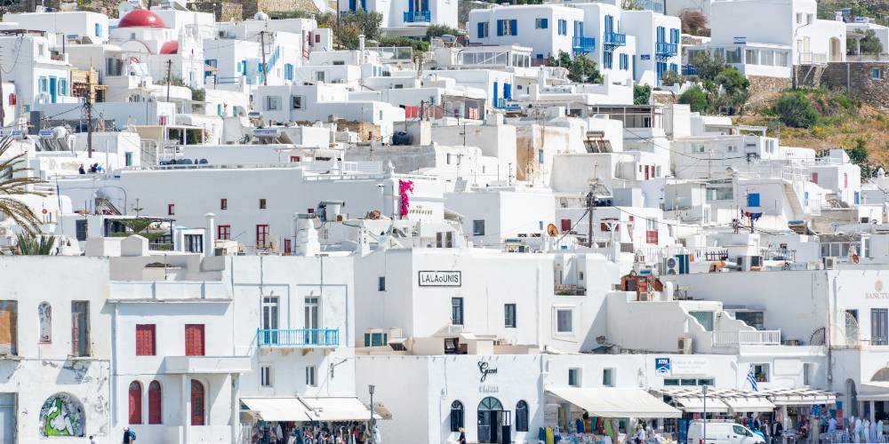 Picturesque whitewashed houses and narrow alleys in Mykonos Town (Chora)